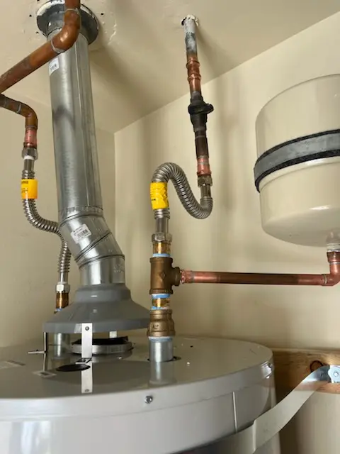 Water heater installation and plumbing repair in Heaton